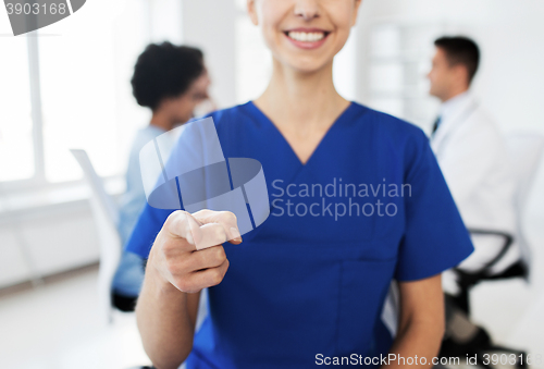 Image of close up of nurse pointing on you at hospital