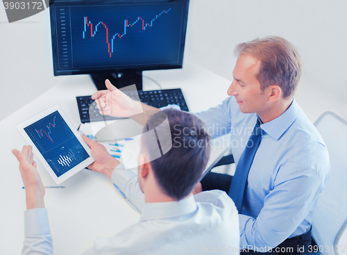 Image of businessmen with notebook and tablet pc