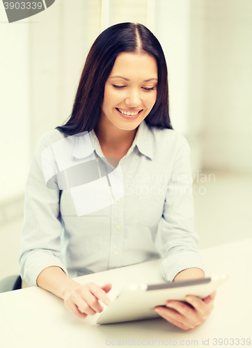 Image of smiling businesswoman or student with tablet pc