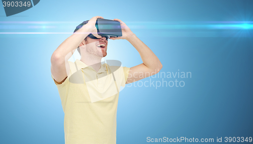 Image of happy man in virtual reality headset or 3d glasses