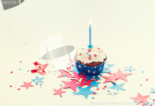 Image of cupcake with candle on american independence day