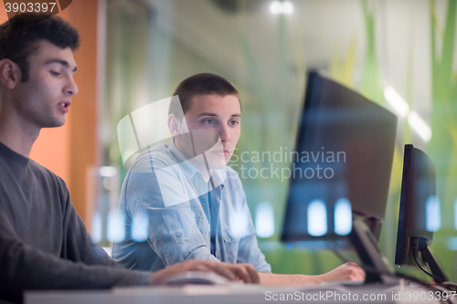 Image of technology students group working  in computer lab school  class