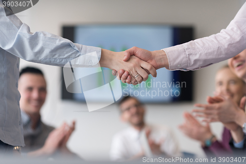 Image of business womans handshake