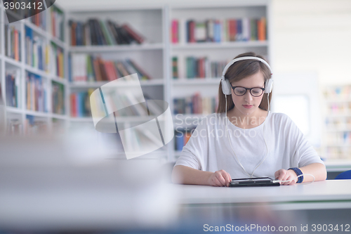 Image of female student study in library