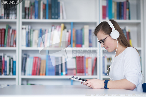 Image of female student study in library