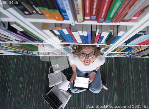 Image of female student study in library