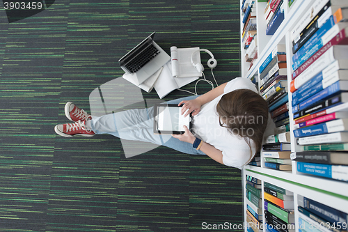 Image of female student study in library