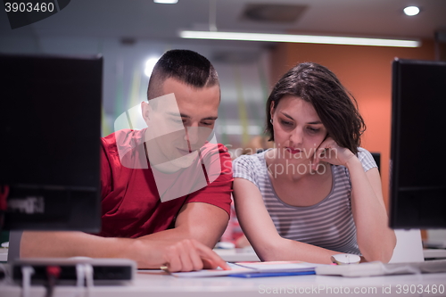 Image of technology students group working  in computer lab school  class