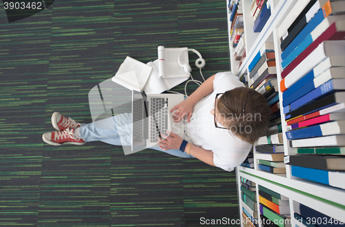 Image of female student study in library