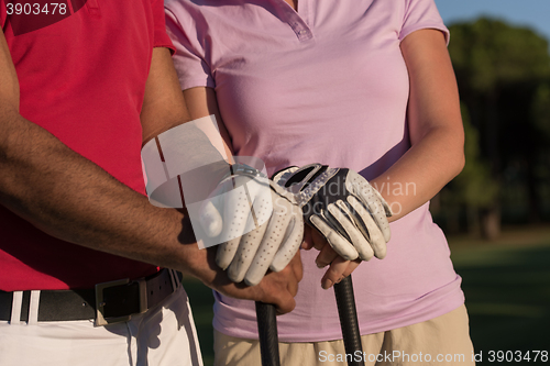 Image of portrait of couple on golf course