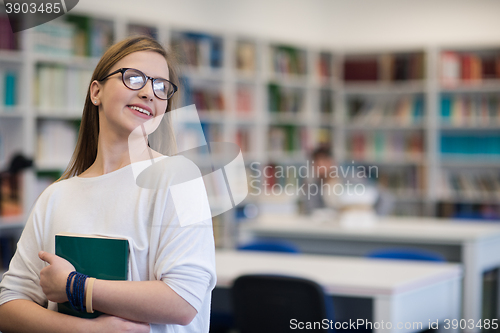 Image of portrait of female student in library