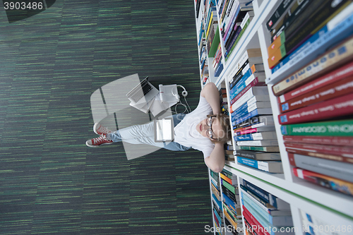 Image of female student study in library