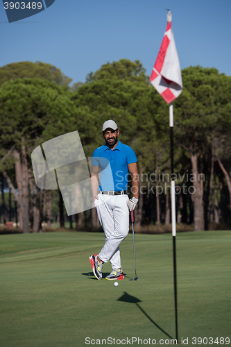 Image of golf player portrait at course