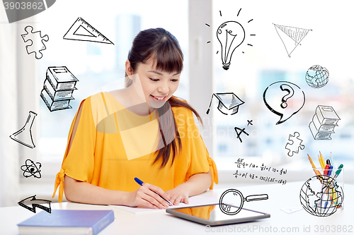 Image of asian woman student with tablet pc at home