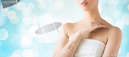 Image of close up of beautiful woman with ring and bracelet