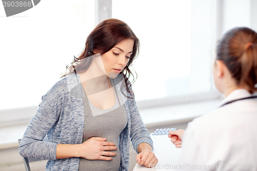 Image of gynecologist doctor and pregnant woman at hospital