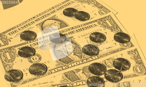 Image of Dollar coins and notes - vintage