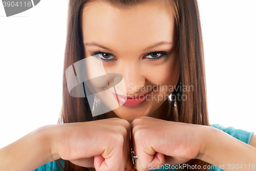 Image of portrait happy young woman exults pumping fists