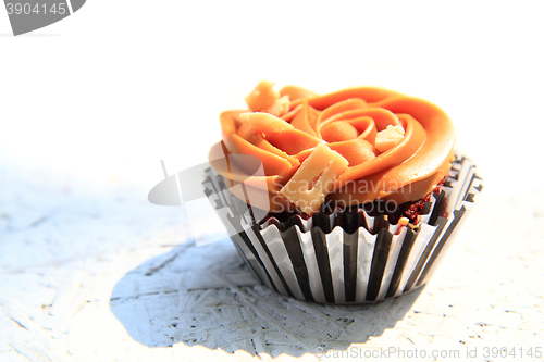Image of caramel cupcake isolated