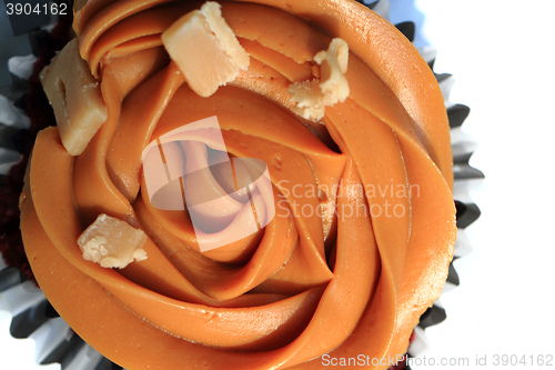 Image of caramel cupcake isolated