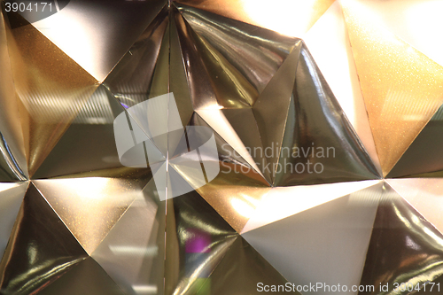 Image of abstract gold triangles texture