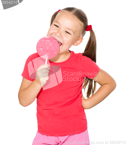 Image of Little girl with lollipop