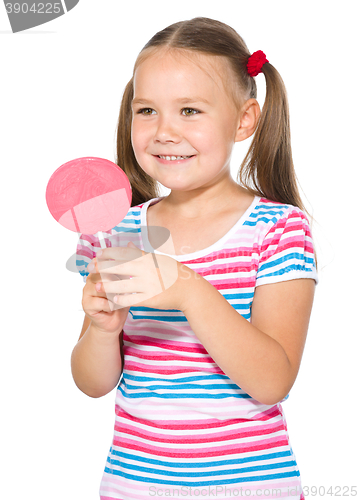 Image of Little girl with lollipop