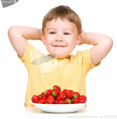 Image of Little boy with strawberries
