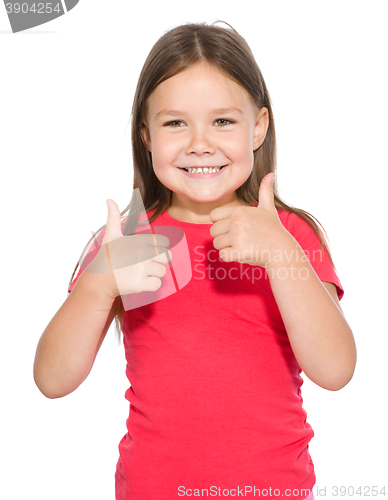 Image of Little girl is showing thumb up gesture