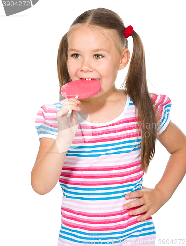 Image of Little girl with lollipop