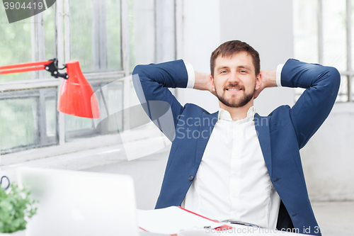 Image of The male office worker resting