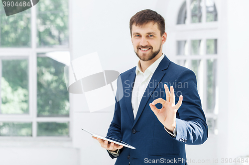 Image of The elegant businessman in  the office