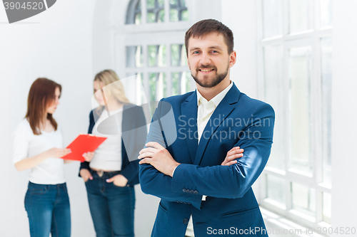 Image of Male and female office workers.
