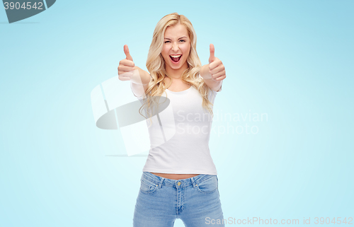 Image of happy young woman or teenage girl in white t-shirt