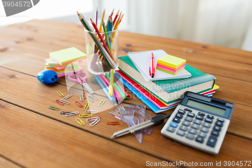 Image of close up of stationery or school supplies on table