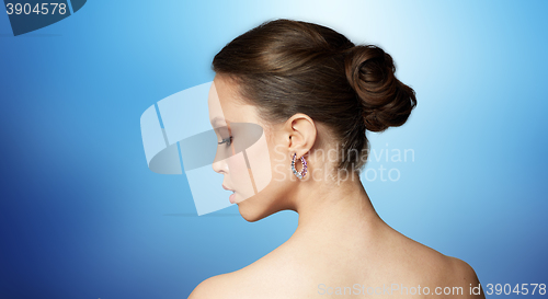 Image of close up of beautiful woman face with earring