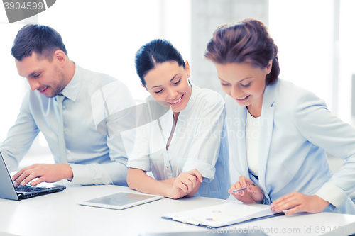 Image of business team working in office