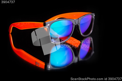 Image of colored sunglasses.