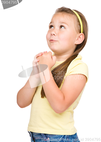 Image of Cute little girl is praying