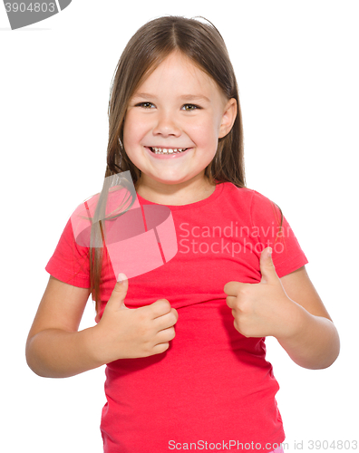 Image of Little girl is showing thumb up gesture