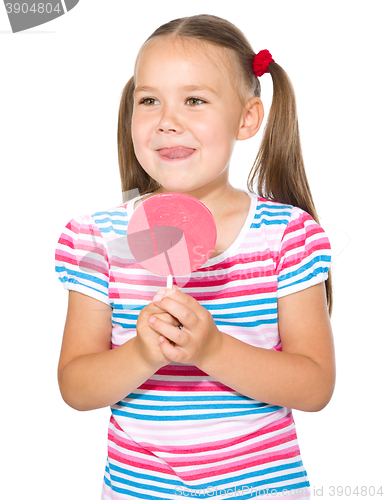 Image of Little girl with lollipop