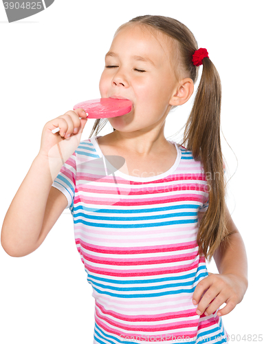 Image of Little girl with lollipop