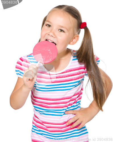 Image of Little girl with lollipop