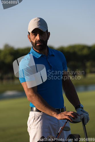 Image of golfer  portrait at golf course