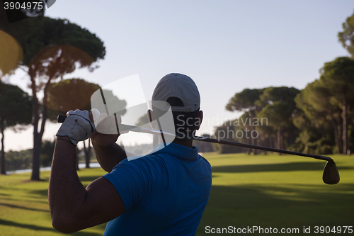 Image of golf player hitting shot