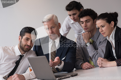 Image of business people group on meeting at modern startup office