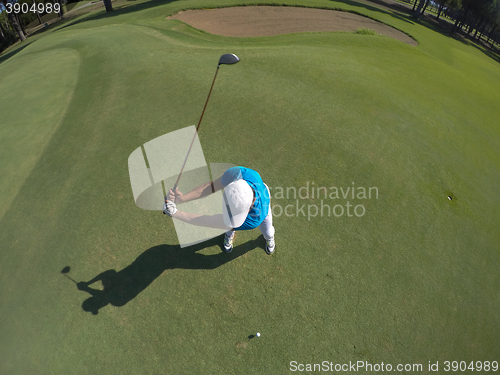 Image of top view of golf player hitting shot