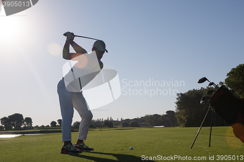 Image of golf player hitting shot