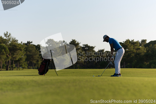 Image of golfer hitting long shot