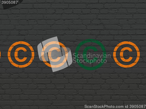 Image of Law concept: copyright icon on wall background